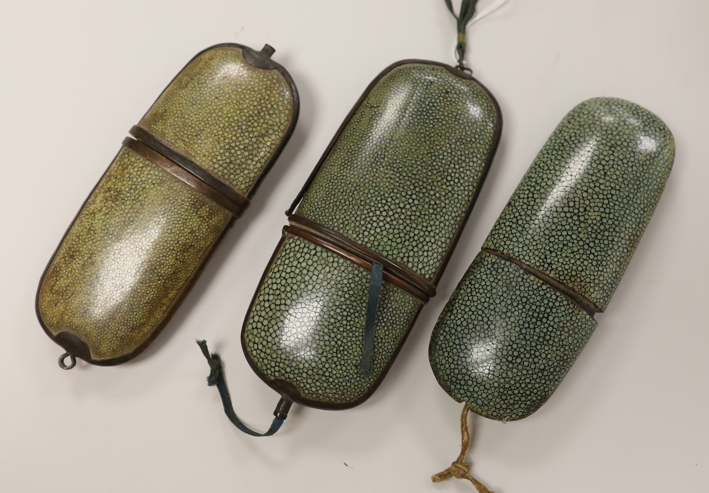 Three Victorian shagreen spectacle cases and one pair of spectacles